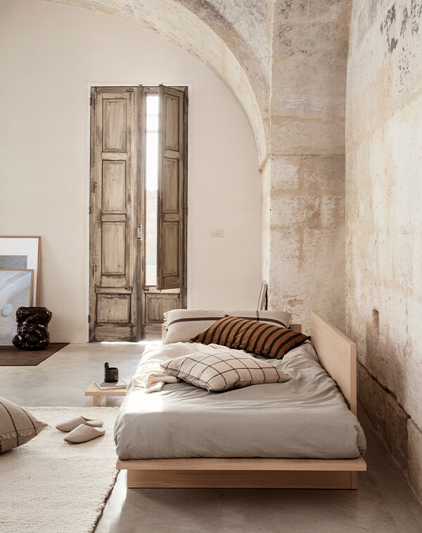 ferm LIVING Kona Day Bed with cushions and bedding