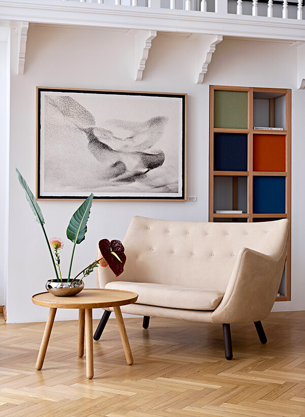 Mid-century room with House of Finn Juhl Poet Sofa