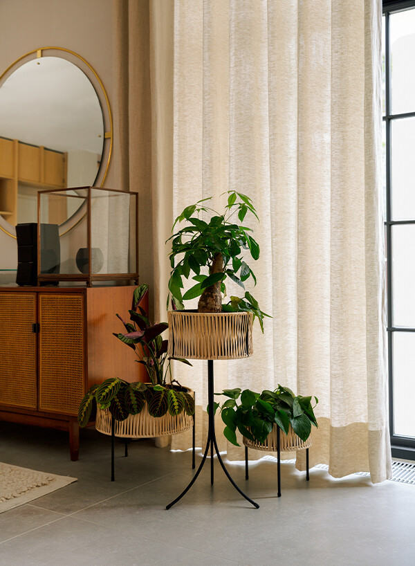 Bohemian styled room with Audo Copenhagen Umanoff Planters