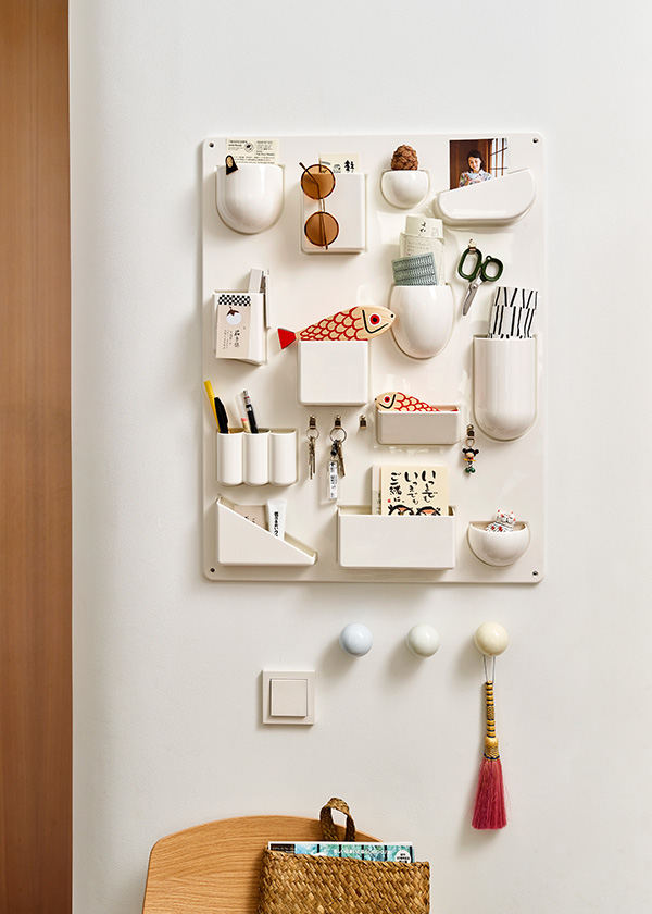 White Uten Silo wall hanger holding stationary and accessories