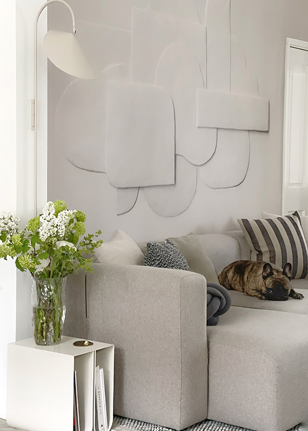 HAY Mags sofa with the Ferm Living Arum Wall Lamp and the Kristina Dam Studio Curved Side Table