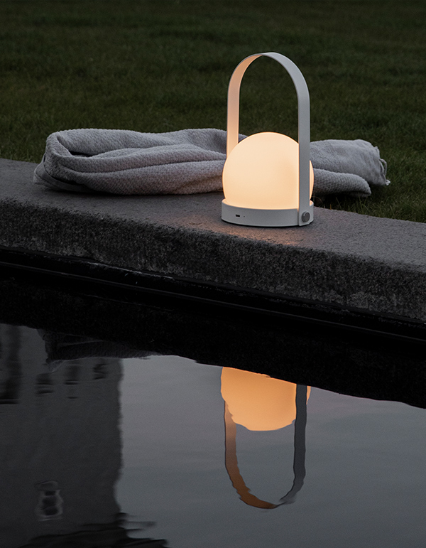 White Audo Copenhagen Carrie Outdoor Lamp outside
