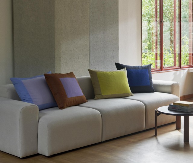 HAY Mags sofain minimal interior with cushions and wooden Rey Coffee Table 