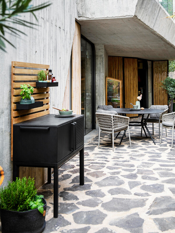 Cane-line Drop Outdoor Kitchen Unit outside a modern home