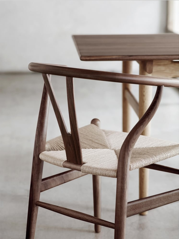 Back detail of Carl Hansen CH24 Wishbone Chair in walnut