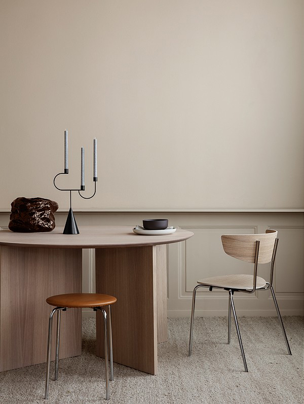 Ferm Living Avant Candelabra in a wooden dining table