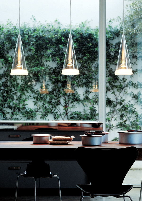 Row of 3 Flos Fucsia Suspension Lights above a dining table