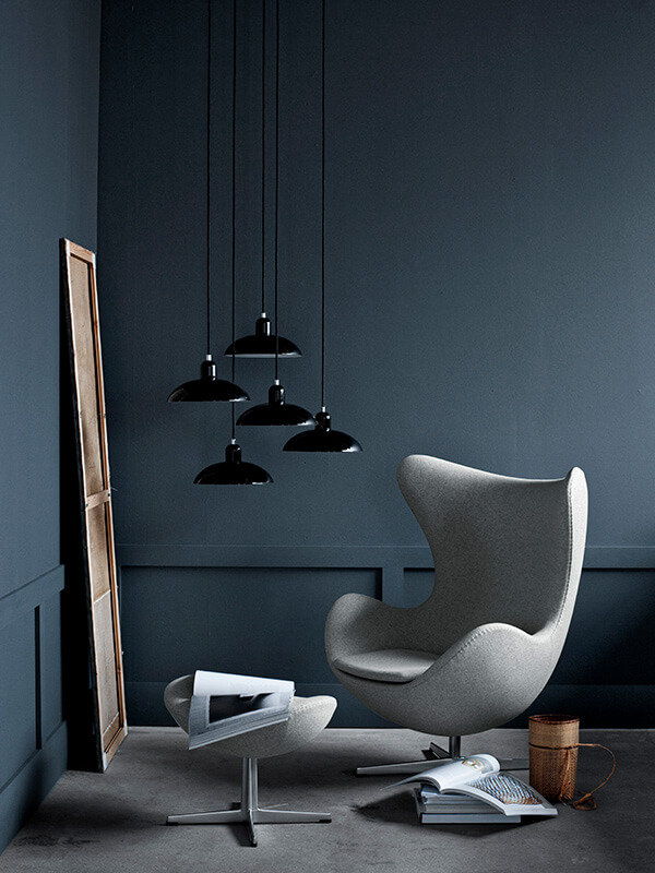 Cluster of Kaiser Idell Pendant Lamps alongside the Fritz Hansen Egg Chair