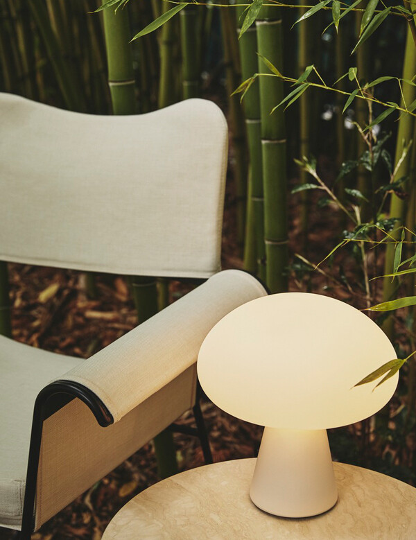 Gubi Obello Table Lamp in an outdoor setting