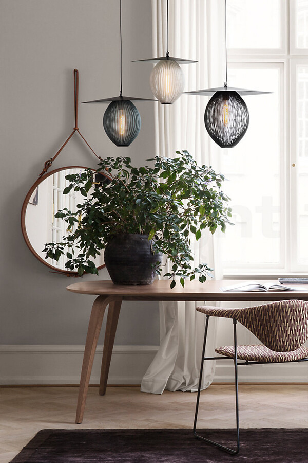 Group of 3 Gubi Satellite Pendant Lights above a desk