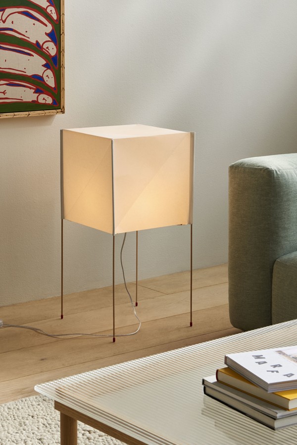 HAY Paper Cube Floor Lamp, pictured on within a living room setting by the sofa
