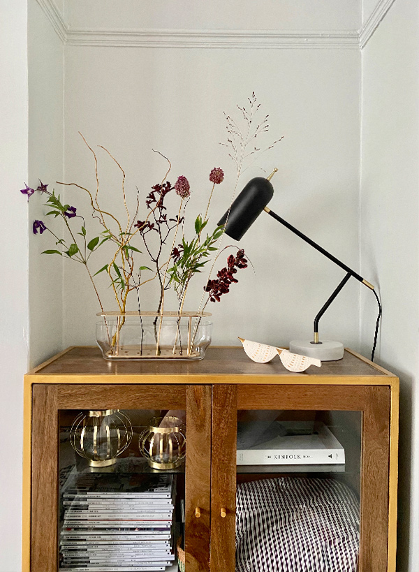 Fritz Hansen Ikebana Vase on a wooden sideboard