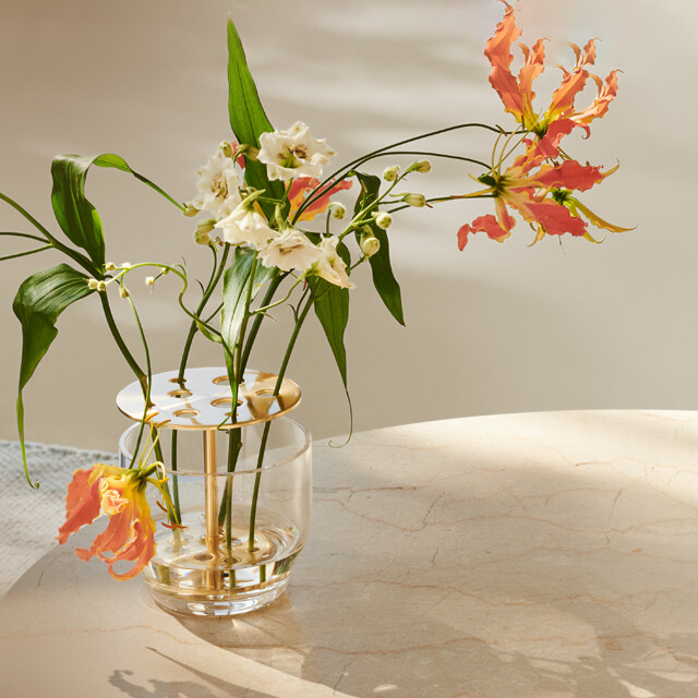 Fritz Hansen Ikebana Vase Small with vibrant spring flower arrangement 