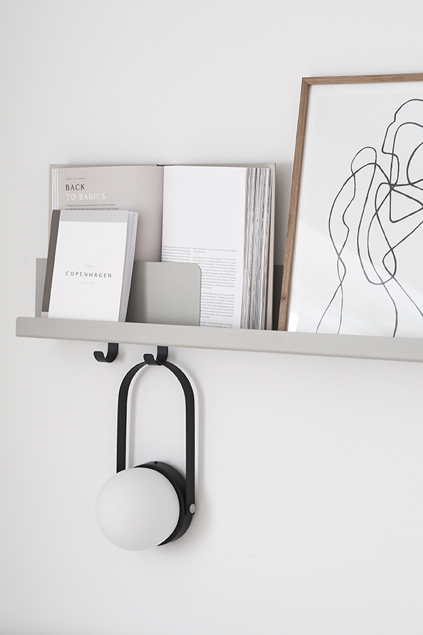Audo Carrie LED table lamp hanging on the Muuto folded shelves