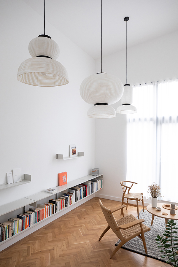 Andtradition Formakami Pendant lights in a minimal living room setting