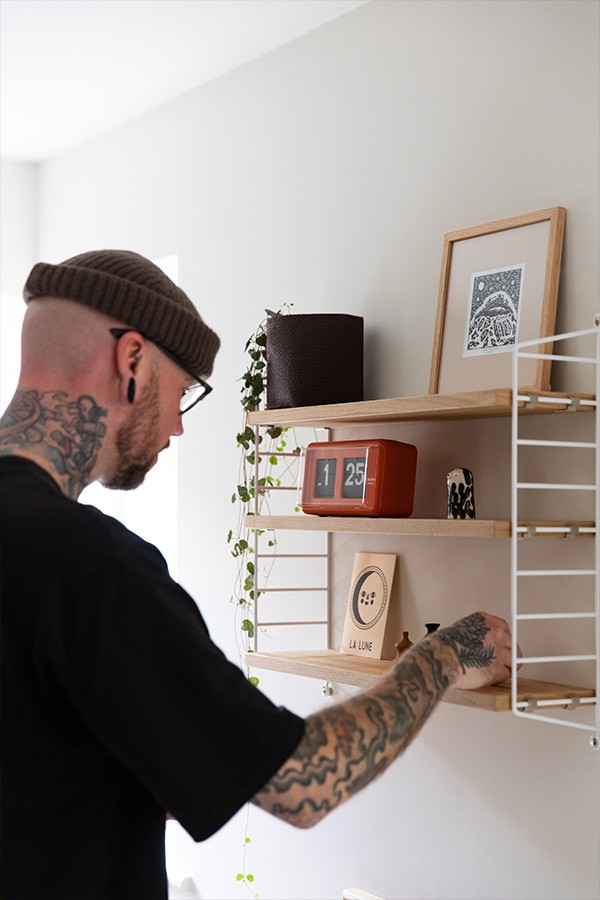 Liam Rimmingon styling his String Pocket Shelving