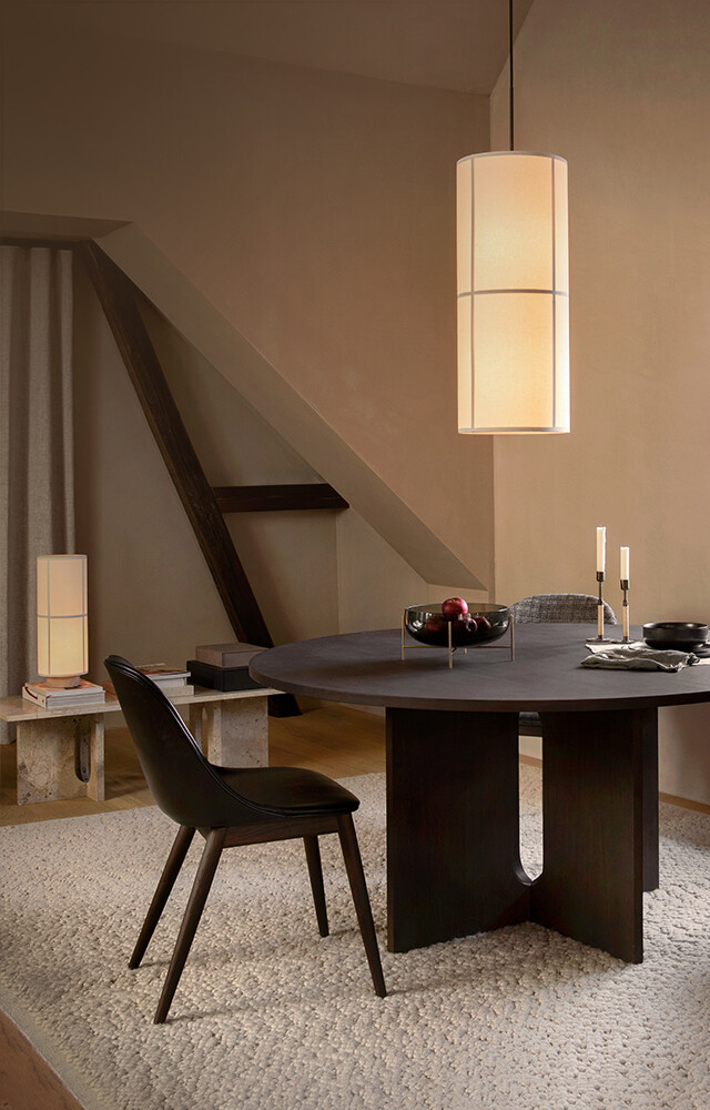 MENU Hashira Pendant Light and Table Lamp in cosy dining room setting with feature window
