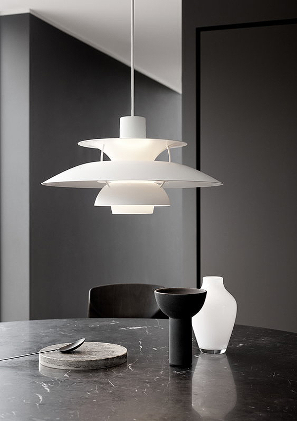 White Louis Poulsen PH 5 Monochrome Pendant Light above a table