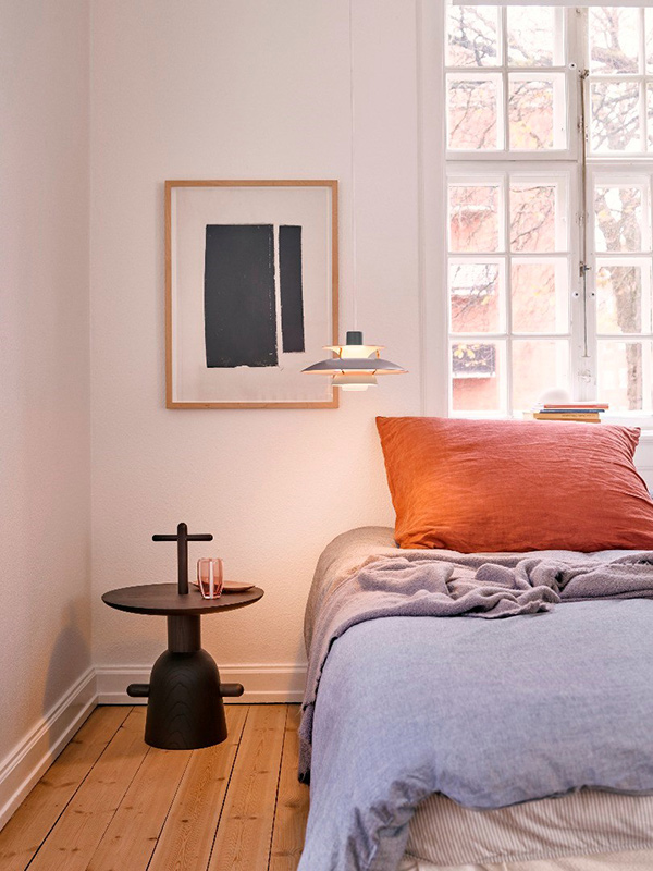 Louis Poulsen PH5 Mini Pendant Light in a bedroom
