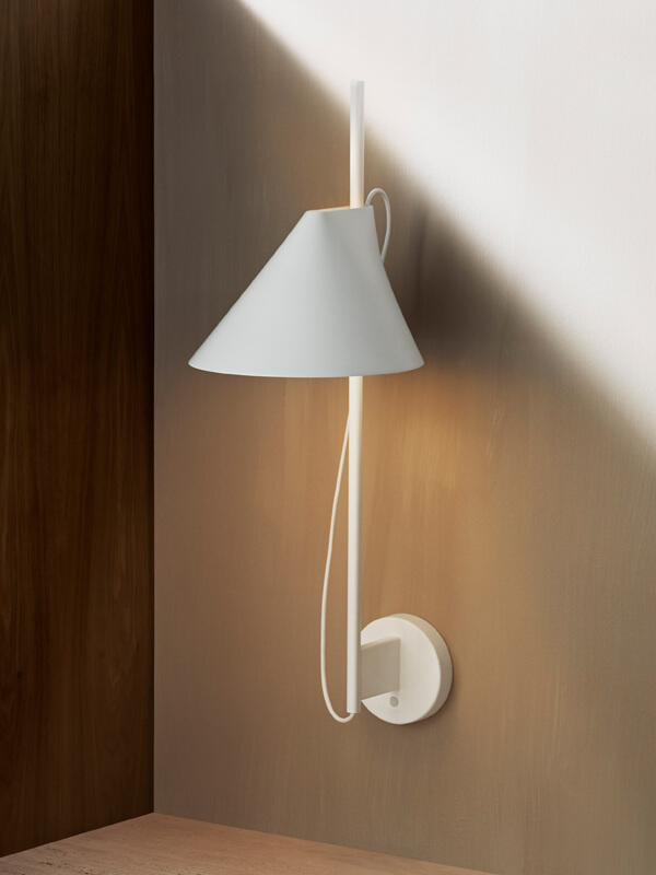 White Louis Poulsen Yuh Wall Light in bedroom