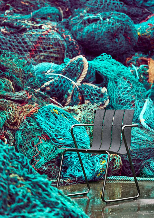 The Mater Ocean Chair surrounded by old fishing nets