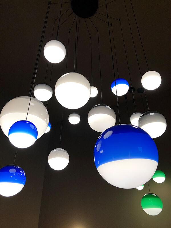 A cluster of Marset Dipping Pendant Lights