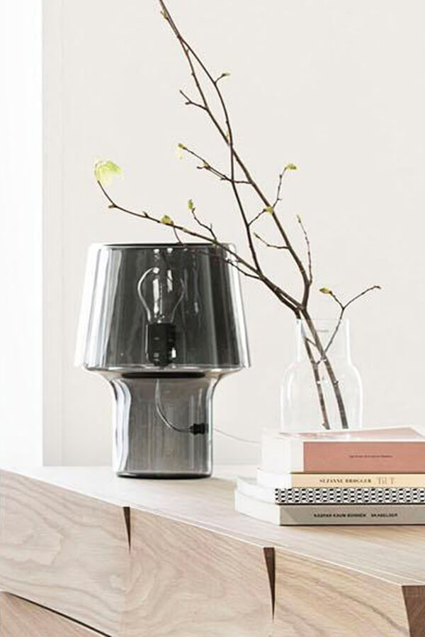 Muuto Cosy In Grey Table Lamp on sideboard