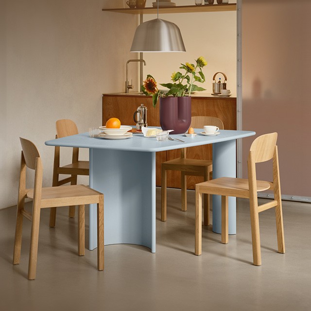Muuto Ambit pendant pictured over Re-Form Dining Table in Scandi kitchen space 