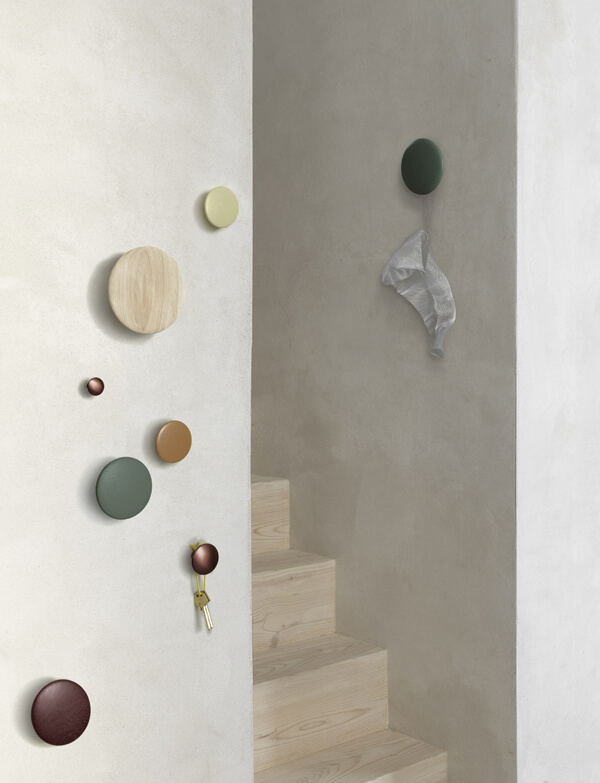 A collection of Muuto The Dots Coat Hooks