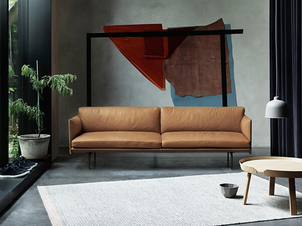 Muuto Outline Three Seater Sofa in Cognac Leather in living room
