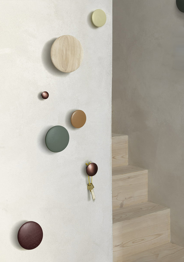 An assortment of Muuto The Dots Coat Hooks