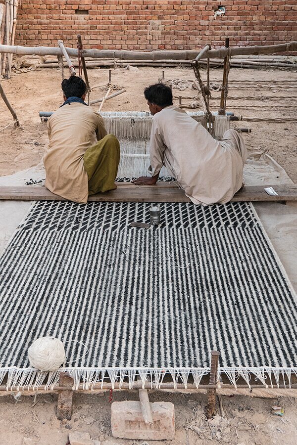 The nanimarquina Blur Rug being hand produced by craftsmen
