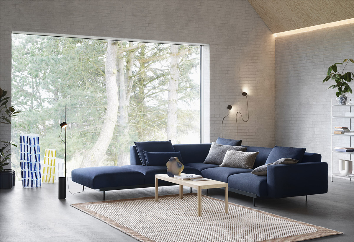 Navy Blue Muuto In Situ Sofa in front of large window