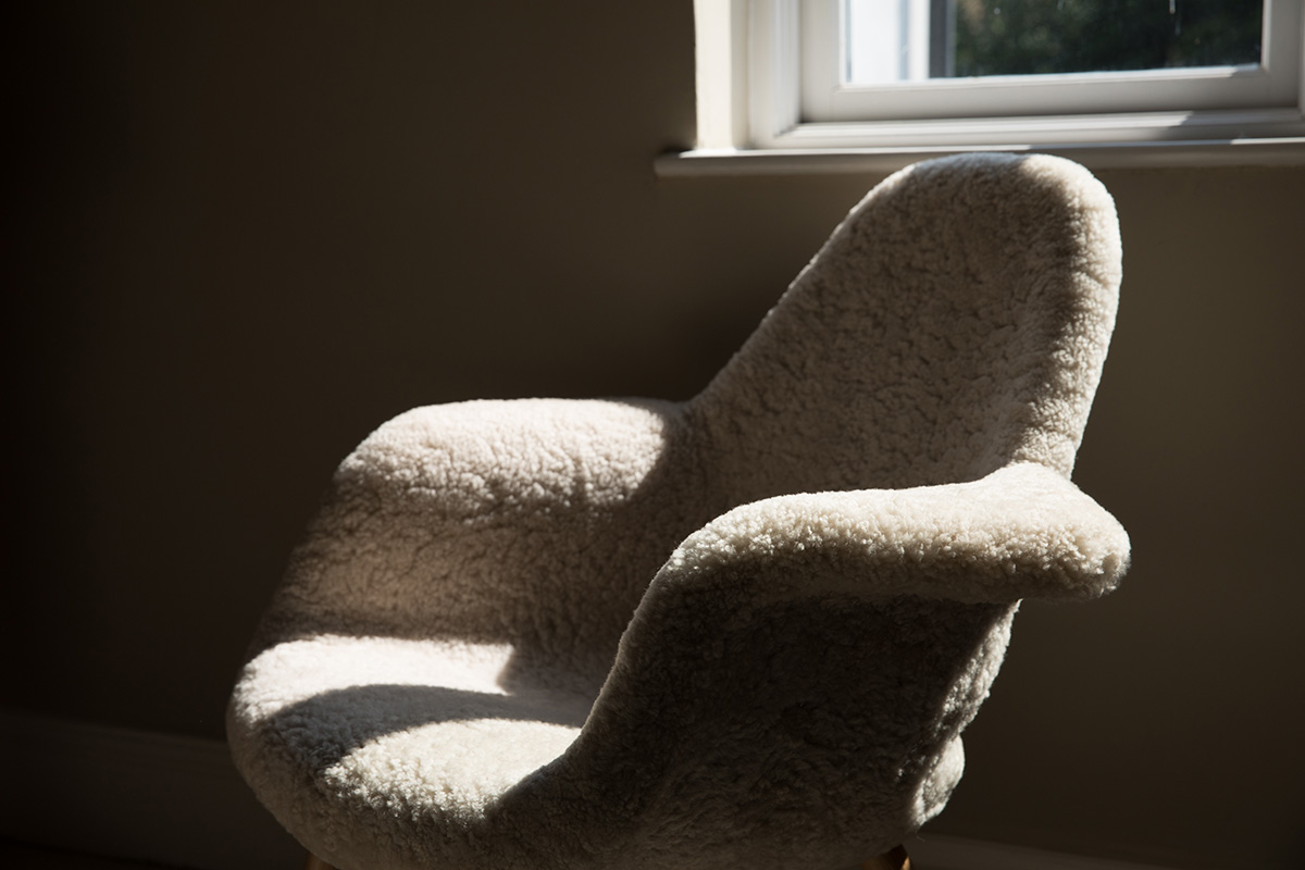 Detail of the Vitra Organic Chair in Sheepskin