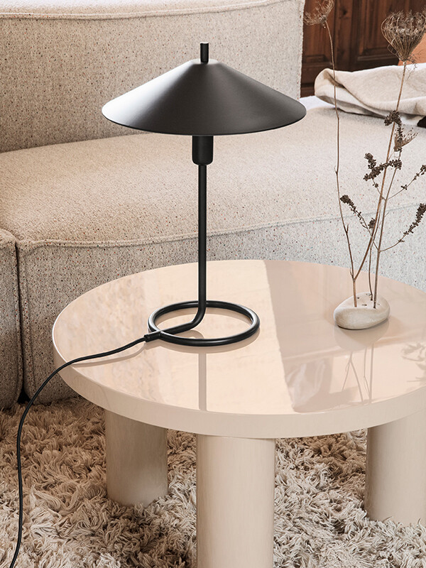 The Ferm Living Filo Table Lamp placed on the Post Coffee Table
