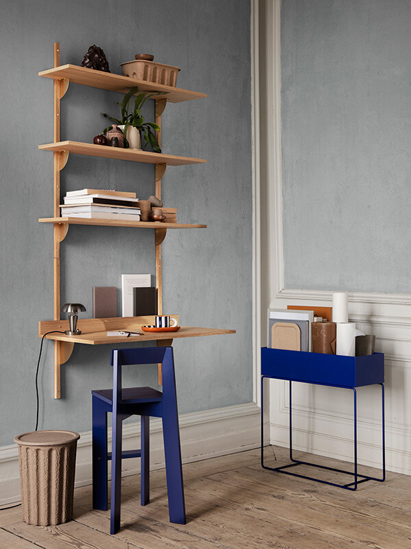 The Ferm Living Plant box in bright blue featured in Scandi room setting