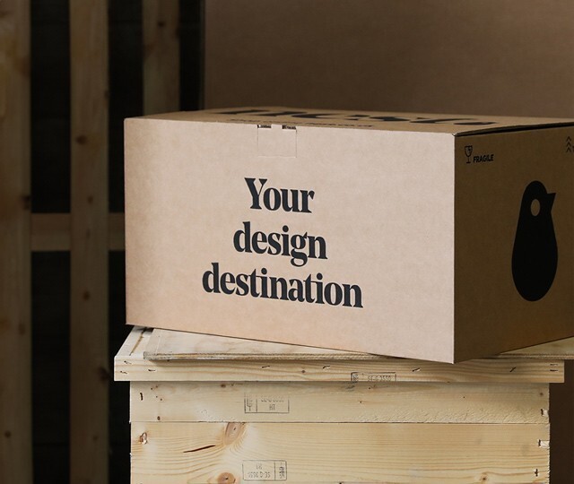 Nest delivery packaging on top of wooden crate