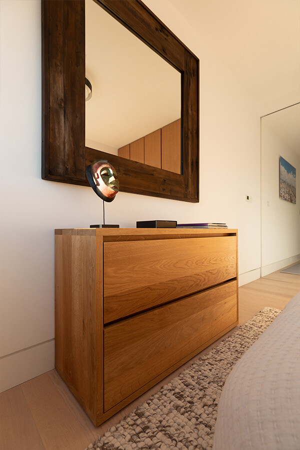 Oak E15 SB05 Imari Chest of Drawers in a bedroom