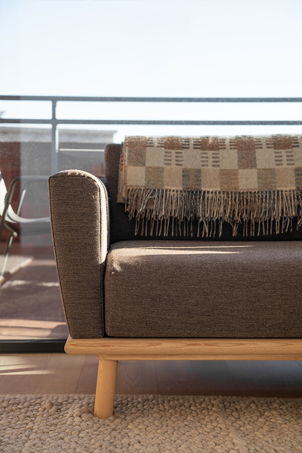 Detail of the Nikari Linea Sofa in brown fabric