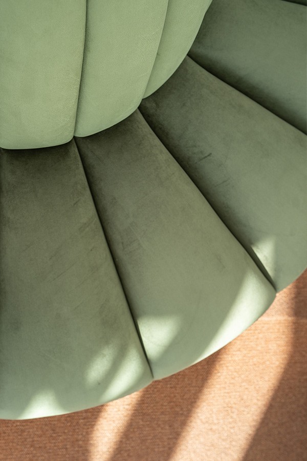 Close up on the green sofa