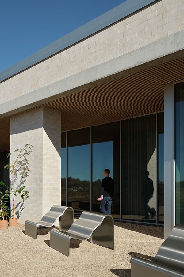 Muuto Dream View Bench arranged as a trio in commercial outdoor setting