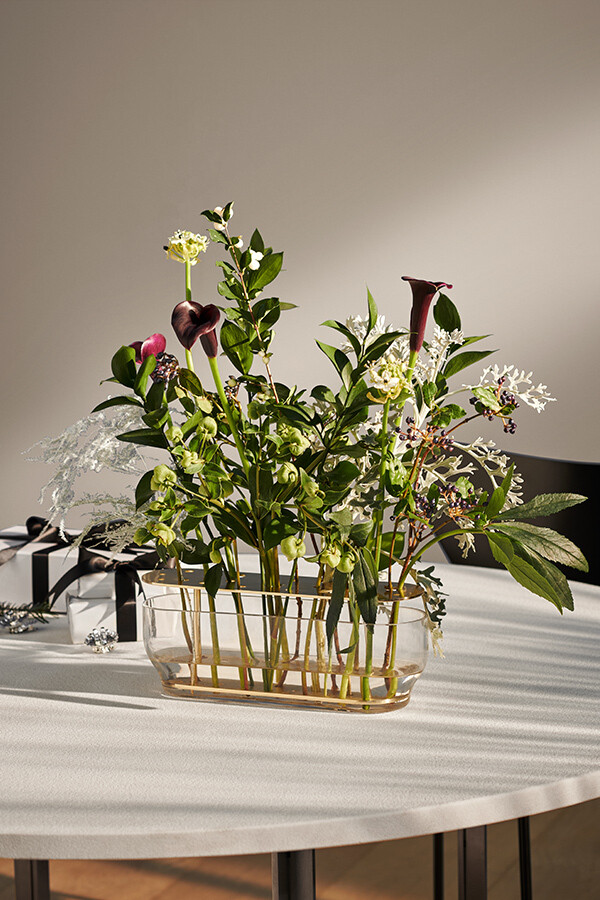 Long Fritz Hansen Ikebana Vase with autumnal flowers