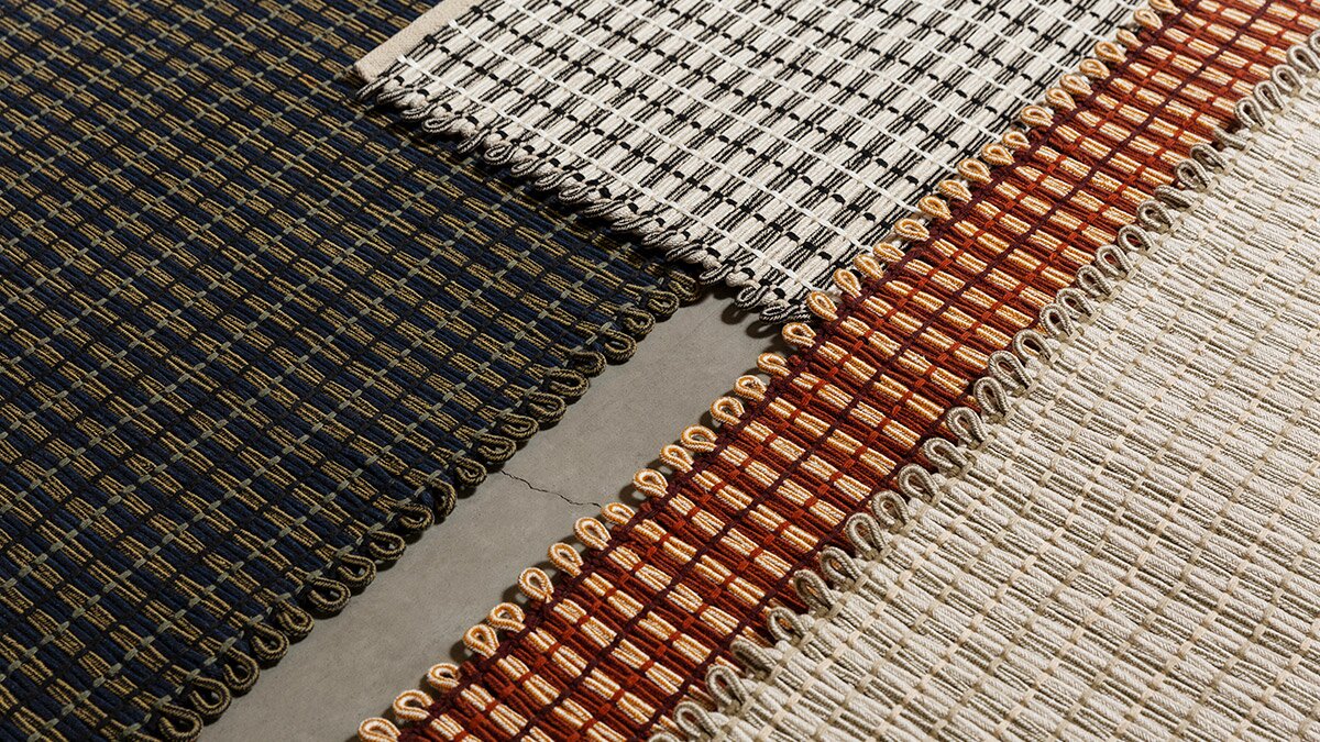 A close up image of four hem rope rugs overlapping
