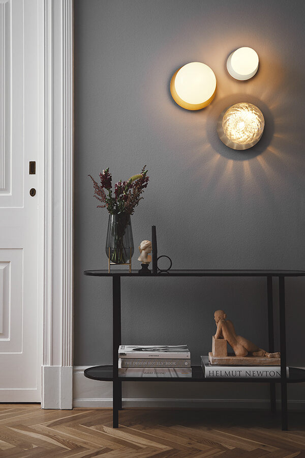 Nuura Liila Wall Light cluster against a dark grey wall