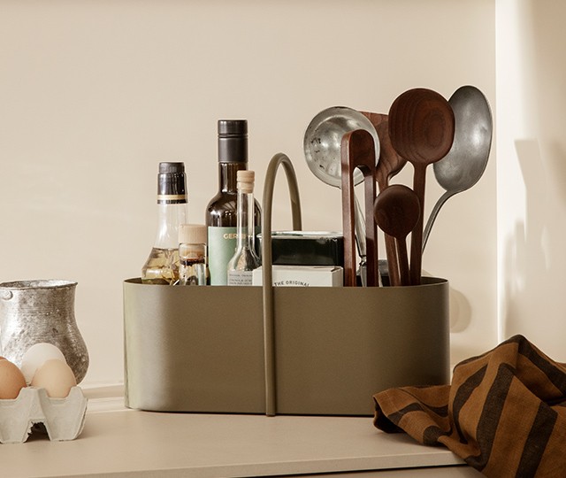 Muuto Kink Vase in light blue with spring flowers