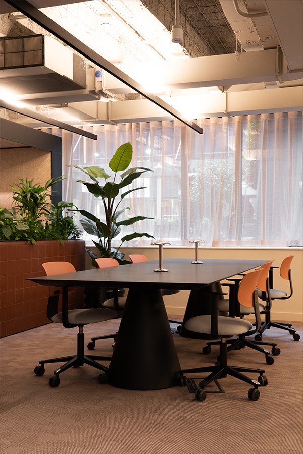 The FLOS Gustave Portable Lamps provide flexibility and movement within Pall Mall Workspace