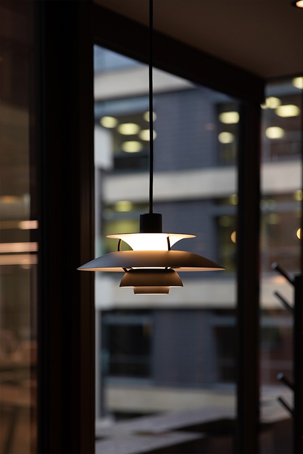 PH 5 Mini Monochrome Pendant Light hanging above lounge breakout area in Pall Mall Workspace