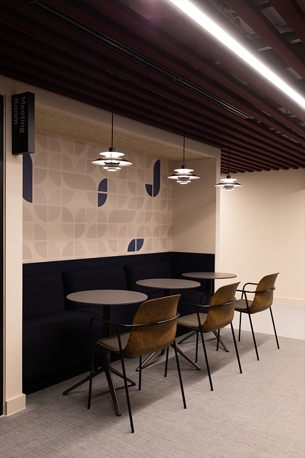 PH 5 Mini Monochrome Pendant Light hanging above cafe seating in Pall Mall Workspace