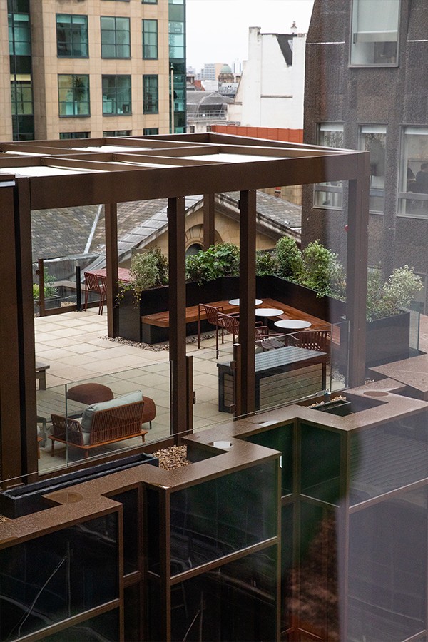 Pall Mall exterior shot of the outdoor piazza featuring HAY Palissade seating