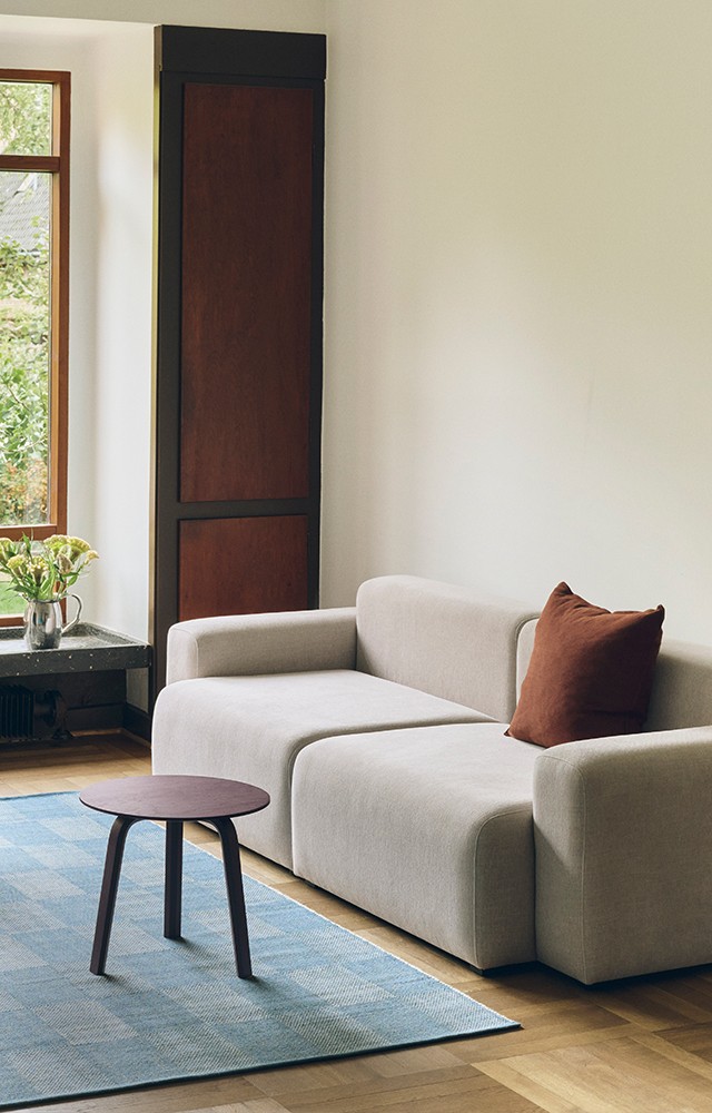 HAY mags in home setting with blue rug, walnut wall panelling and new Aplat Table Lamp